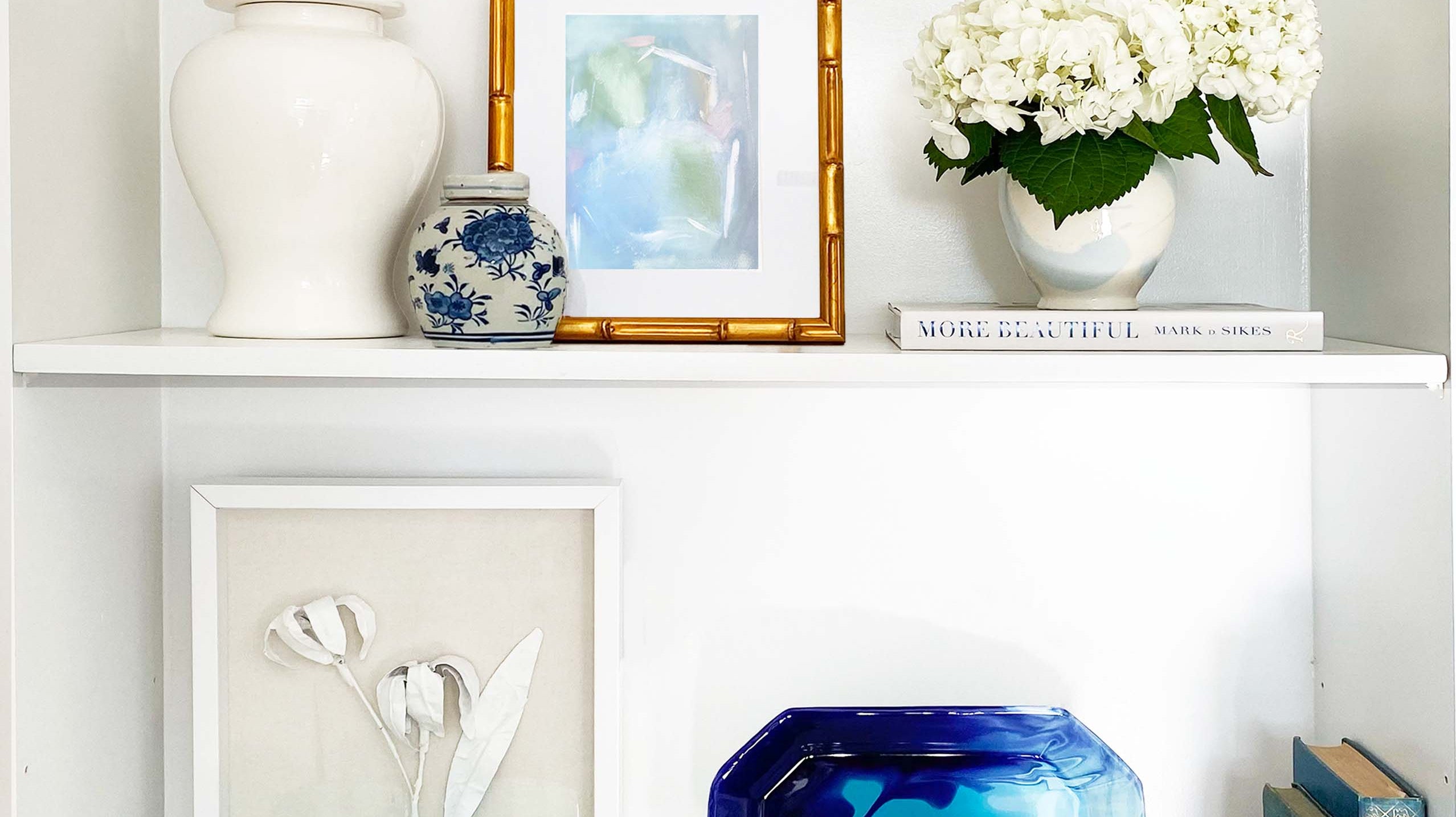 Elevate Your Space: 3 Expert Tips for Styling Art on Shelves